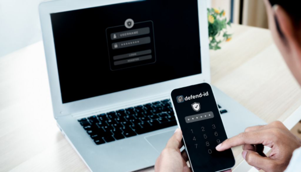 Employee using two-factor authentication to protect identity on phone and laptop