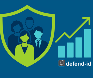 Flat illustration of diverse employees inside a lime-green shield next to an upward bar chart and defend-id logo—symbolizing the ROI of offering identity-theft protection as a voluntary benefit.